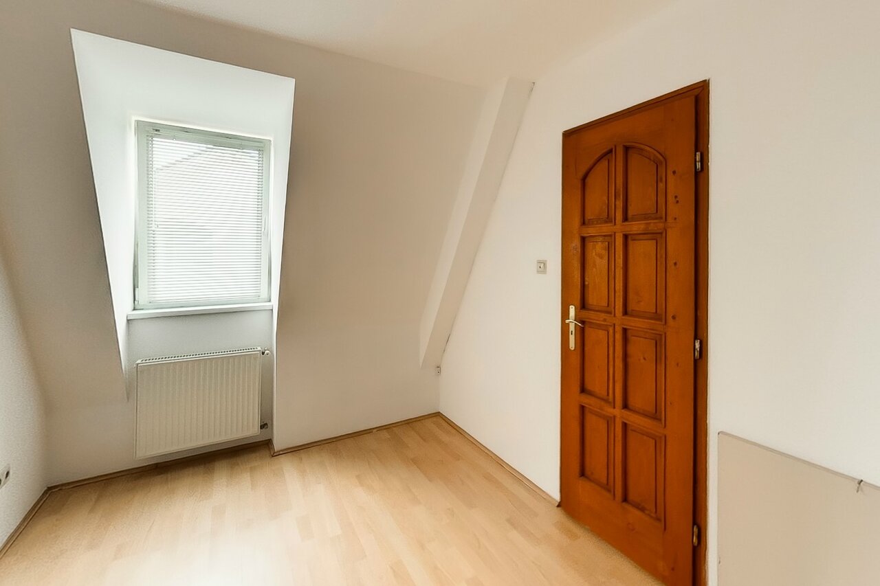 Felújított tetőtéri szoba